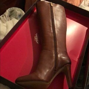 Knee high leather heel boots.